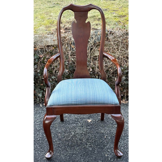 Beautiful set of traditional dining chairs by Harden. Features solid cherry construction , splat back, cabriole legs and...