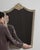 This mirror makes its impression through whitewashed carved crest frame, arched. The piece dates to 20th Century, sourced...