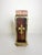 The matchbox is not included! French fireplace accessory dating from the 1950s, featuring a decorative brass-tone frame...