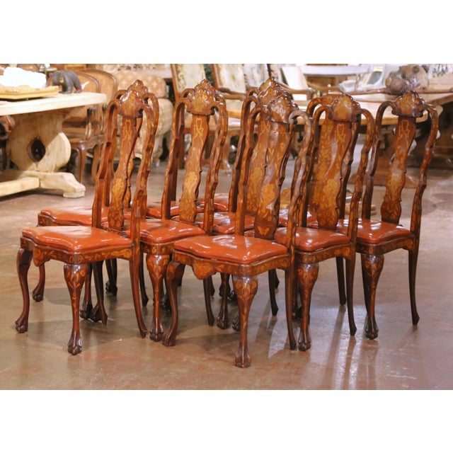 This impressive set of ten antique dining chairs was crafted in the Netherlands circa 1890 and exemplifies the exuberant...