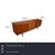 A sideboard that gets everything right that makes mid-century design so beloved. The warm wood body rests on slender,...