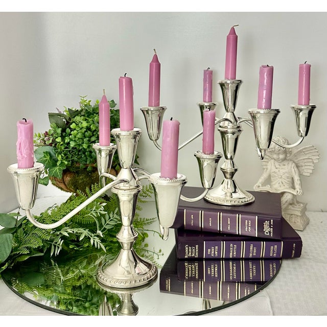 This is for a vintage pair of Sterling Silver Candelabras by Duchin Creations, crafted in the United States. Each...