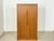 High-quality wardrobe made of genuine teak wood, bringing Scandinavian elegance directly to your bedroom. This Danish...