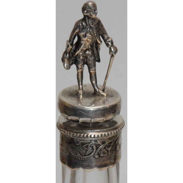 Featured is a beautiful decanter and six cordial cups made up of engraved crystal and sterling silver. The decanter is...