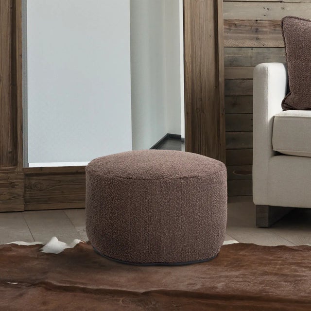The Barbet Chocolate Pouf Our Pouf Foot Ottomans are a great add on to any decor. They work as a foot rest or extra...