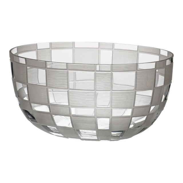 Oval free hand shaped bowl in transparent Murano glass with detailed hand cut irregular checkered opaque squares designed...