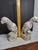 This matched pair of Mid-Century Modern WBI Chinese Parrot Figurines in Famille Rose style feature a floral pattern with...