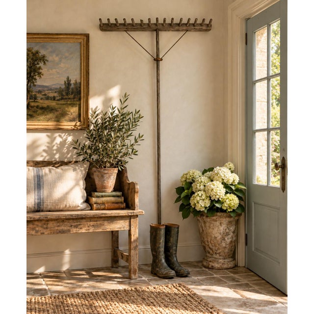 A wonderfully sculptural early 20th century wooden hay rake garden tool, with a beautifully weathered surface that only...