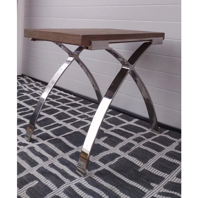 Great table sculptural solid steel base with white washed wood top.