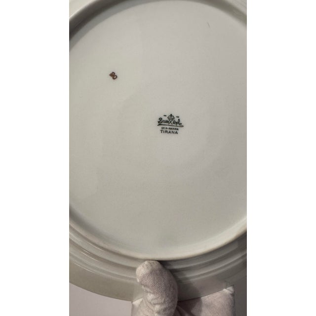 A vintage double-handled porcelain cake plate and serving platter by Rosenthal, produced at the Selb-Bavaria factory in...