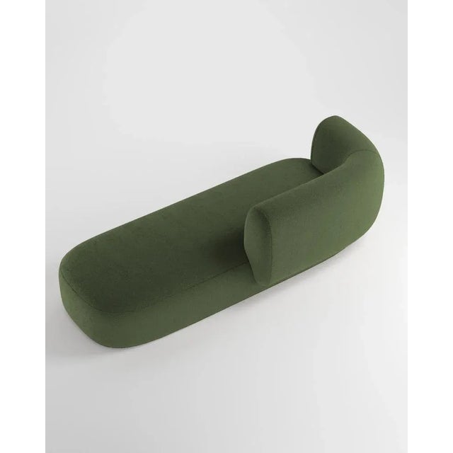 Hug sofa is defined by clean, simple lines and a distinctive armrest detail. The armrest, half overlapping the seat...