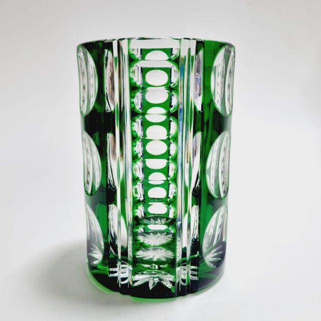 Vintage tinted lead crystal vase from the 1970s. Its vibrant, fresh green color scheme makes the interior more...