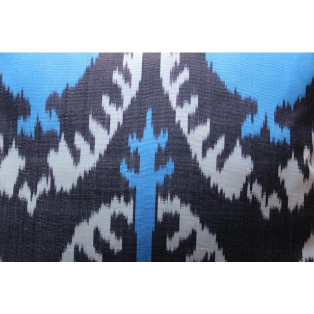 This luxurious pillow is handmade using silk ikat. Our ikats are handwoven by highly skilled artisan weavers in Turkey...