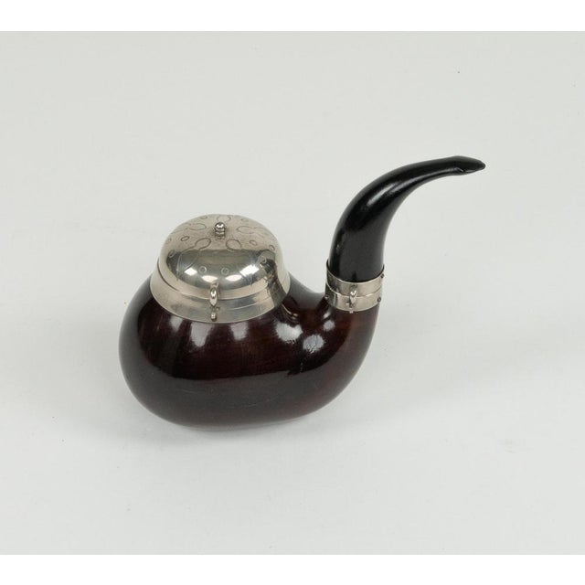 Midcentury amazing tobacco holder a shape of pipe in wood and steel by Aldo Tura for Macabo. Made in Italy in the 1950s....