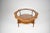 This sculptural circular cocktail table dating from the 1960s, is a definitive example of post-war organic modernism. It...