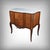 This superb Transition-style commode with a central projection elegantly embodies the refinement of fine furniture....