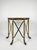 A striking demilune console table with a speckled granite top resting on a sculptural neoclassical-style base. The legs...