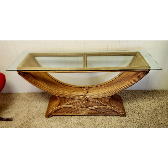 stunningly sensuous console table of pencil reed, in the manner of Gabriella Crespi, vintage 1970s, sweeping lines of...