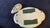 Charming vintage Limoges France pairing — scalloped oval tray and shell dish in white porcelain with gold tulip-and-rose...
