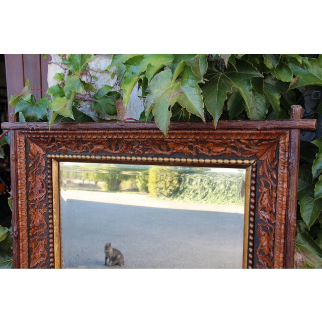 19th-century carved wooden mirror in the naturalistic style in very good condition attributed to the Levera brothers of...