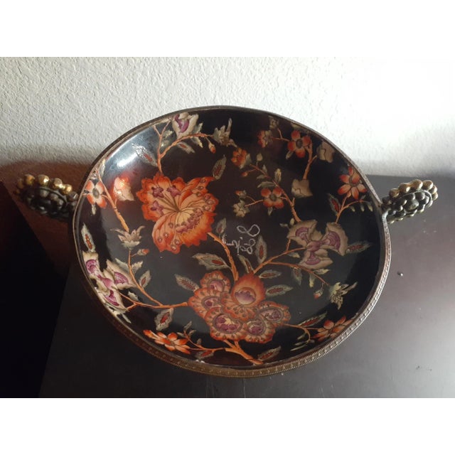 This is Handpainted Moriage Ceramic Floral 7.5" Compote on Solid Ornate Brass Pedestal. Procured at auction BOX 4