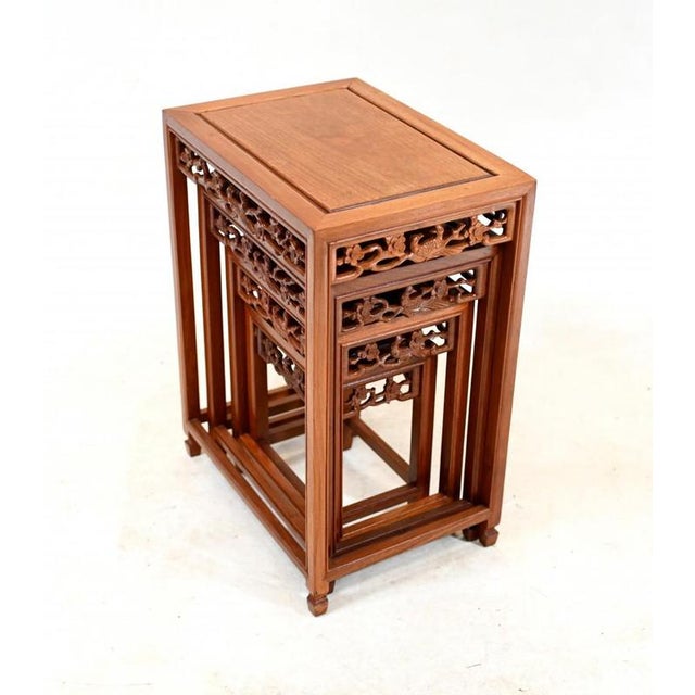 Chinese hardwood nest of tables Set is a quartetto - four tables of different sizes, great for drinks parties Intricately...