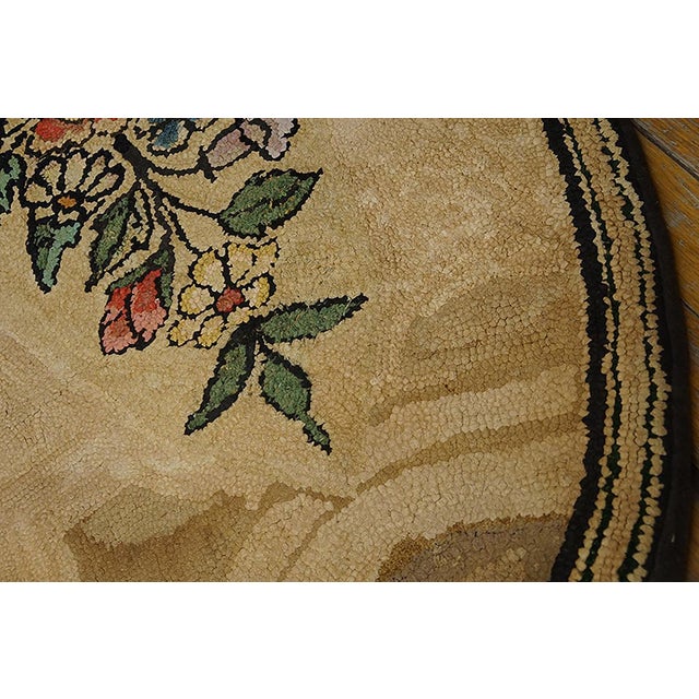 Antique American hooked rug, size: 2'6" x 4'2". Antique Floral Medallion Hand Knotted Pile Rug, Circa Date: 1920s. This...