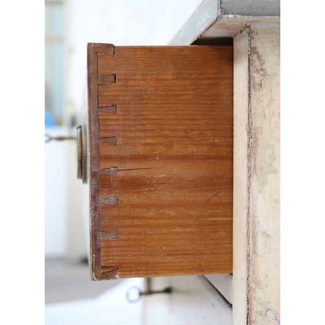 Antique French provincial LXVI style chest of drawers, with rectangular wooden top and parallelepiped frame with three...