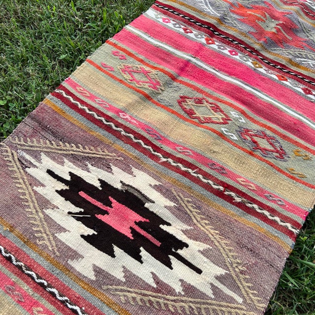 All rugs have been professionally cleaned; original condition is not altered, age-related wear is considered normal in...