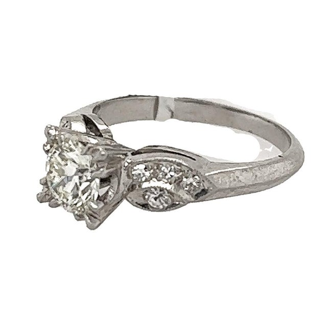Platinum Ring with approximate 0.85 carat transitional cut diamond and 8 single cut diamonds 4.90g size 6.5