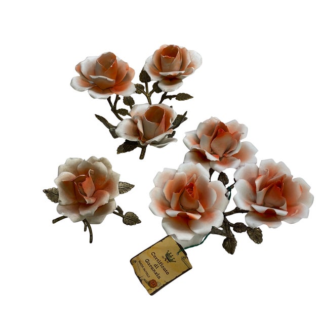 Charming set of three vintage Italian Capodimonte-style porcelain floral sculptures featuring beautifully modeled roses in...