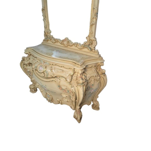 Magnificent Italian Rococo Revival bombe dresser by Silik with matching mirror. This luxurious handcrafted piece showcases...