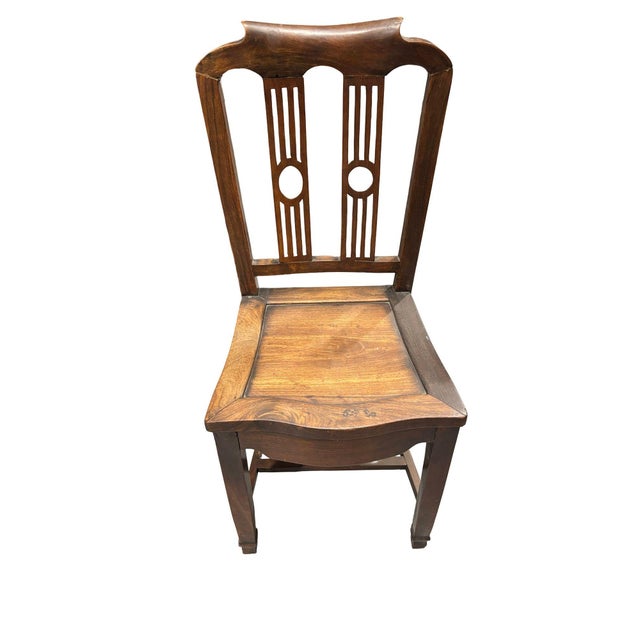 This beautiful English Hepplewhite side dining chair, expertly crafted from solid walnut. Showcases the curves and refined...