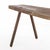 Early 20th-century primitive wood workbench with an exceptionally long plank top measuring over nine feet in length. The...