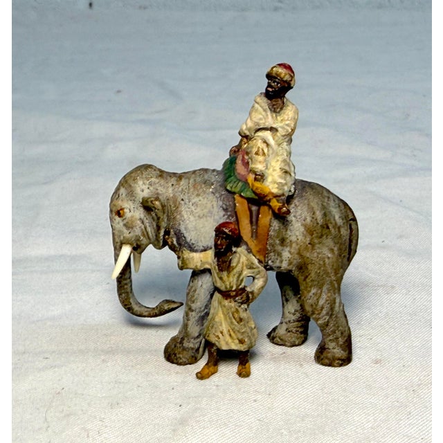 Up for sale is an antique 19th century Austrian Vienna bronze elephant and trainers, a beautifully crafted sculpture made...