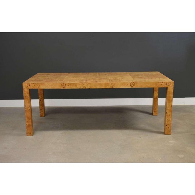 A mid century modern burl Parsons dining table designed by Milo Baughman for Thayer Coggin. Circa 1970’s. Made in USA....