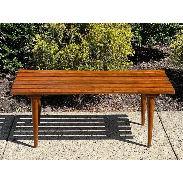 Classic vintage 1960s slat coffee table or bench. This is a versatile piece great for more defined spaces or as an accent...