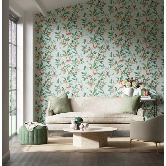 This charming interpretation of an antique chinoiserie wallpaper depicts stylised birds and ripe fruits. A modern take on...