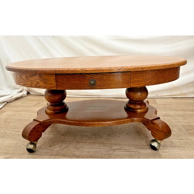 Traditional Oval Coffee Table Tiger Oak, Center Drawer, Shelf, Empire Style, Caster Wheels For Sale - Image 3 of 13