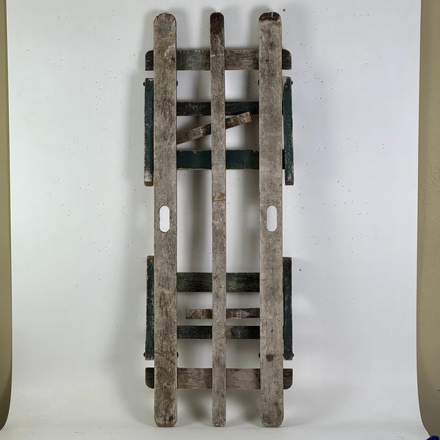 A super lovely vintage folding wood bench for displaying your flowers and plants. At least that's how we envision it....