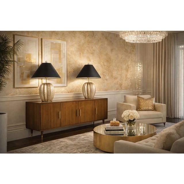 Offering a pair of metallic silver/platinum painted plaster cactus table lamps by Bon Art 1990s. Both lamps are signed and...