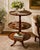 Elegant and beautifully crafted, this vintage three-tier dumbwaiter, also known as a pie table, is an exceptional example...