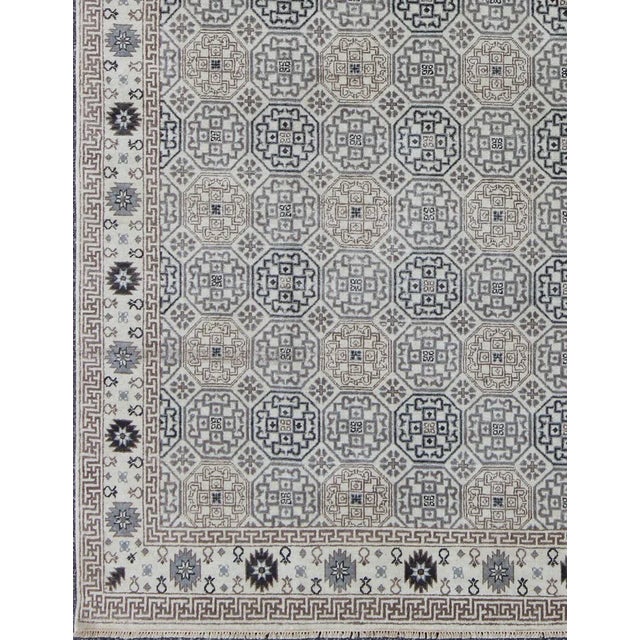 Finely woven Afghan made Khotan rug. Keivan Woven Arts, IN-BAM-59078, 8'2 X 10'3 Afghan Khotan Rug with all over geometric...