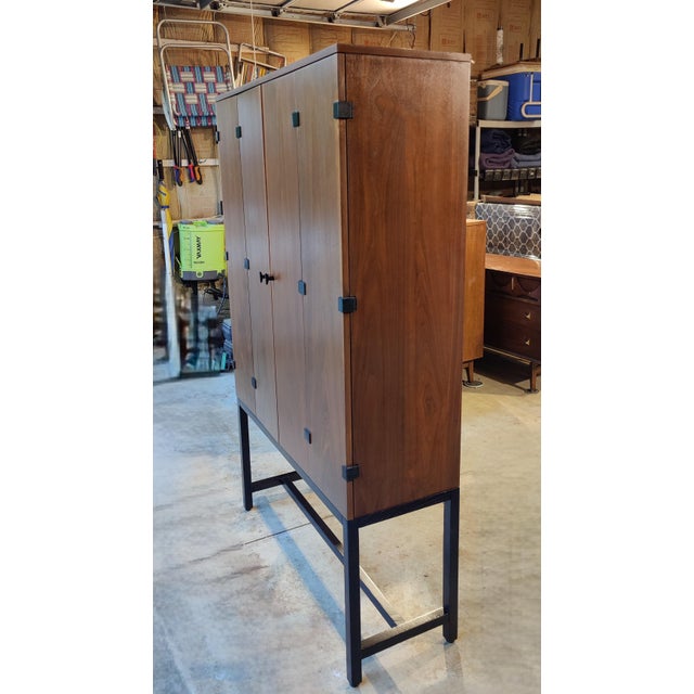 Designed by Milo Baughman for the Directional Furniture, this mid-century modern bar cabinet or buffet would be the focal...