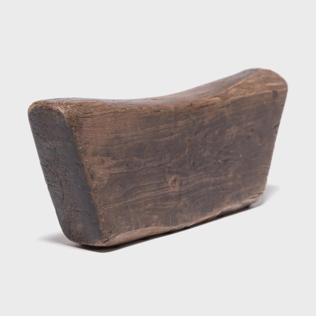 Made of Chinese northern elmwood, this smooth block of wood was once used by an upper-class woman as a headrest. The soft...