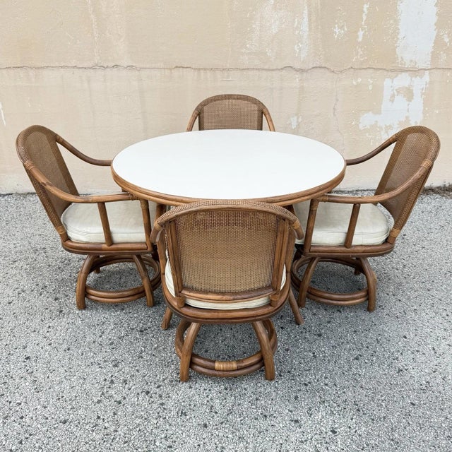 Vintage Hollywood Regency Bentwood Rattan Bamboo Swivel Chair Sunroom Dining Set - 5 Pcs. Set includes (1) Round table...