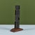 Bronze mounted abstract sculpture. The sculpture showcases an interlocking narrow bronze sculpture on a Douglas fir base....
