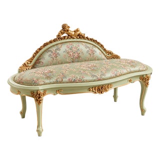 French-Style Green Settee – Floral Upholstery, Gold Leaf Frame & Cherub Crest For Sale
