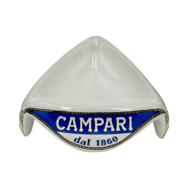 Details: -Wonderful Campari ceramic ashtray with a rope-like tassel design -Reads: "Campari dal 1860" -Made in Italy...