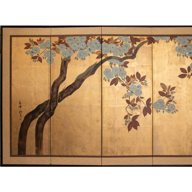 A lovely six-panel painted gold leaf screen depicting Blossoming Plum Tree. Signed and sealed by artist. Gouache,...